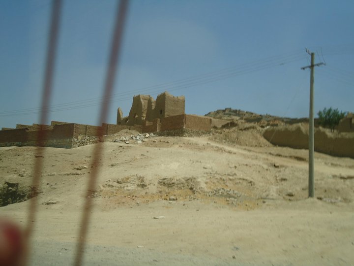 On the way to Arghandeh. At the time, a man was buried near this ruin. For an entire week after his burial, his body ended up dug up next to his grave. The town speculated that he must have been such a bad person, the ground was pushing him out of his grave every night.