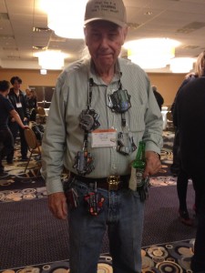 Guy with credit card belt and necklace at Chicago Seminars