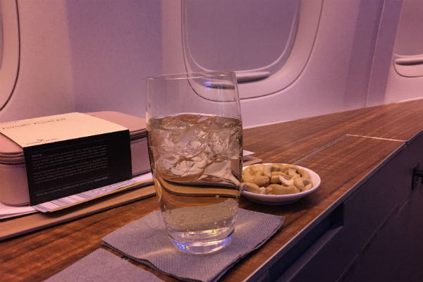Cathay Pacific First Class peanuts served shortly after take-off
