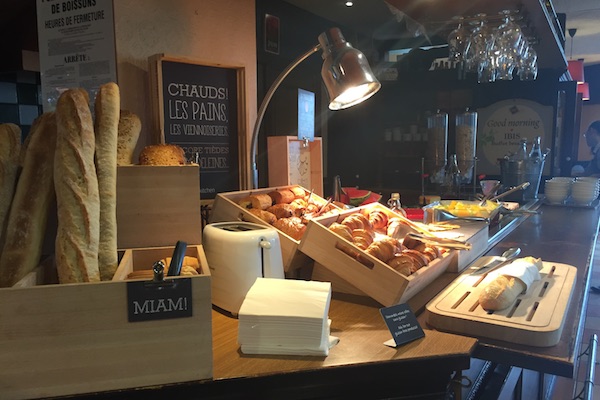 Bread and other breakfast buffet items at Ibis Hotel Calais
