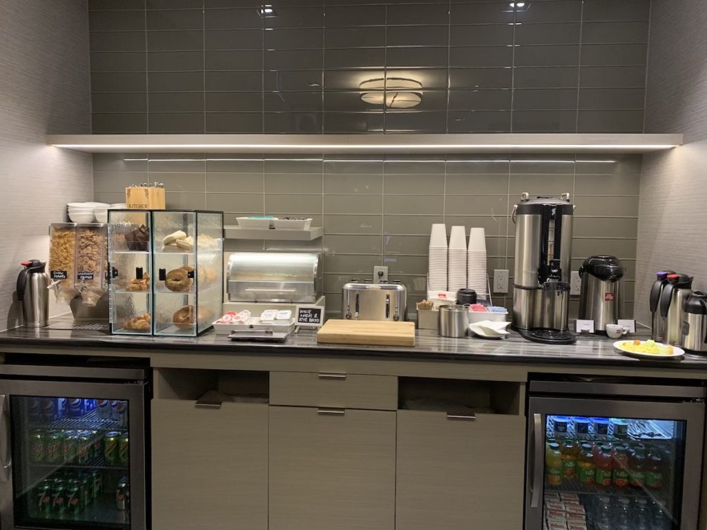 Breakfast bar with cereal bagels coffee
