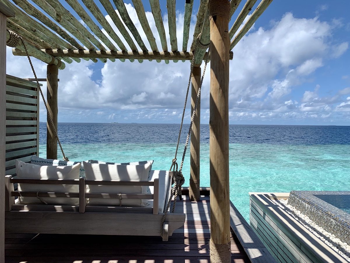 Waldorf Maldives overwater villa swing bed