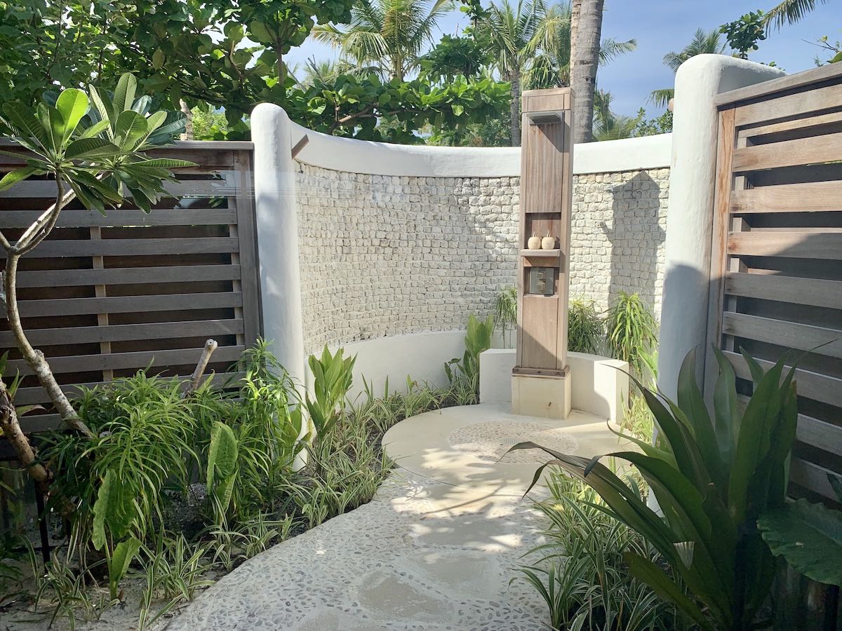 Waldorf Maldives beach villa outdoor shower